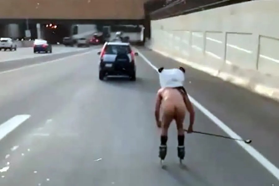 Naked man filmed rollerblading on Ohio highway wearing only panda head